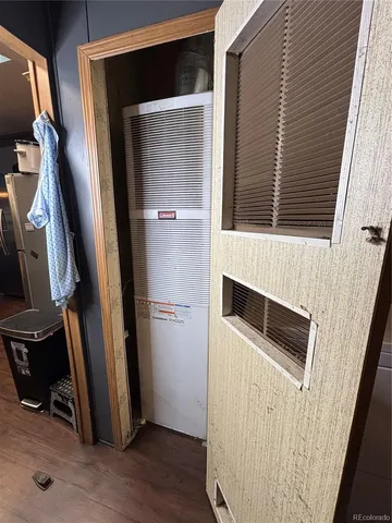 a view of entry way with wooden floor