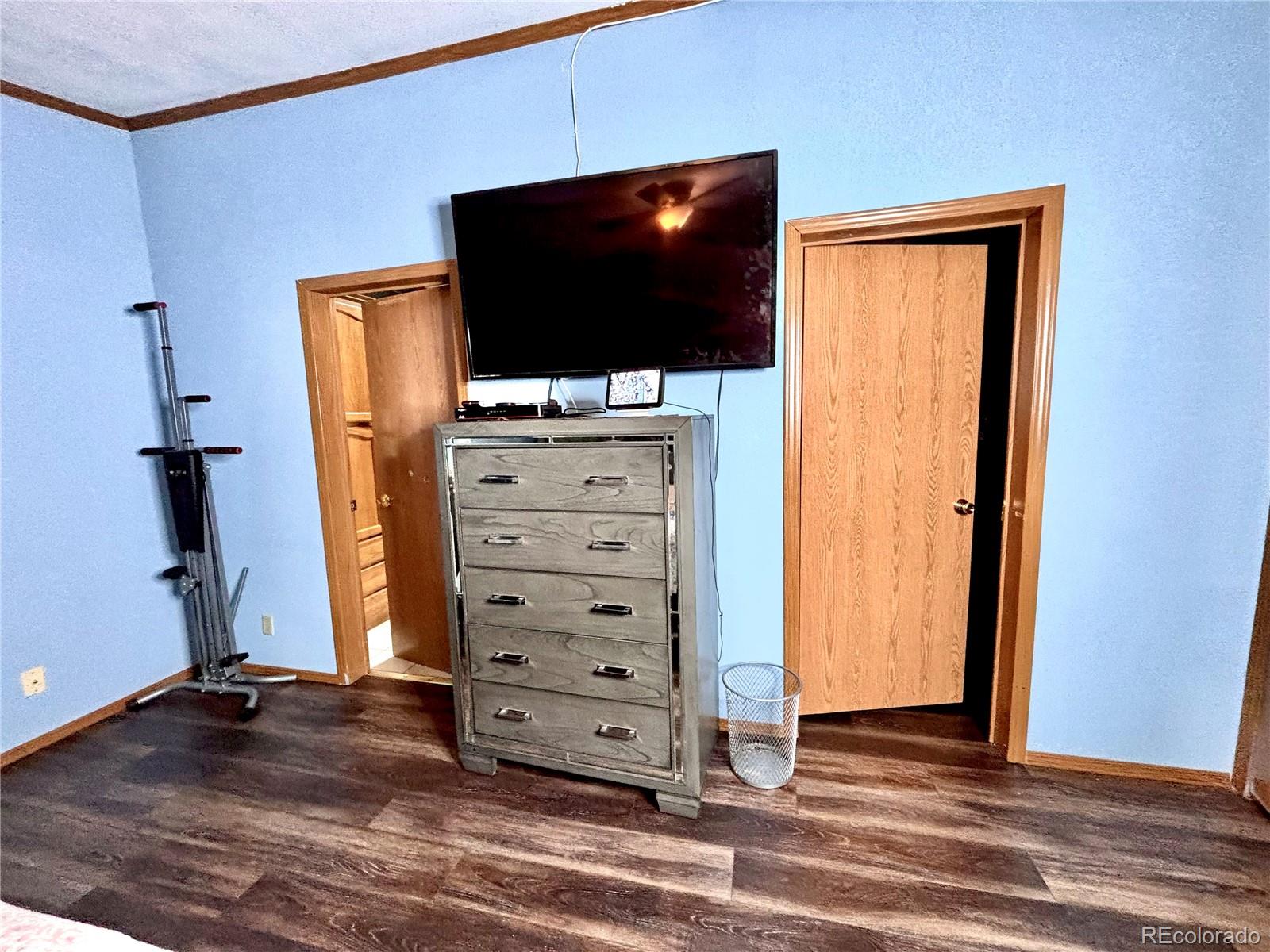 2660 Hawk Street Denver, CO 80260 - Photo 6 of 25 a view of livingroom with furniture and flat screen tv