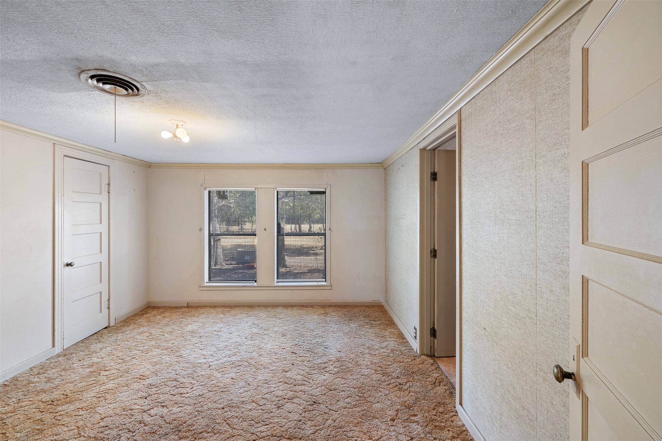 517 First Street Lexington, TX 78947 - Photo 13 of 37 a view of an empty room with a window
