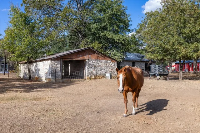 a view of outdoor space with deck and yard
