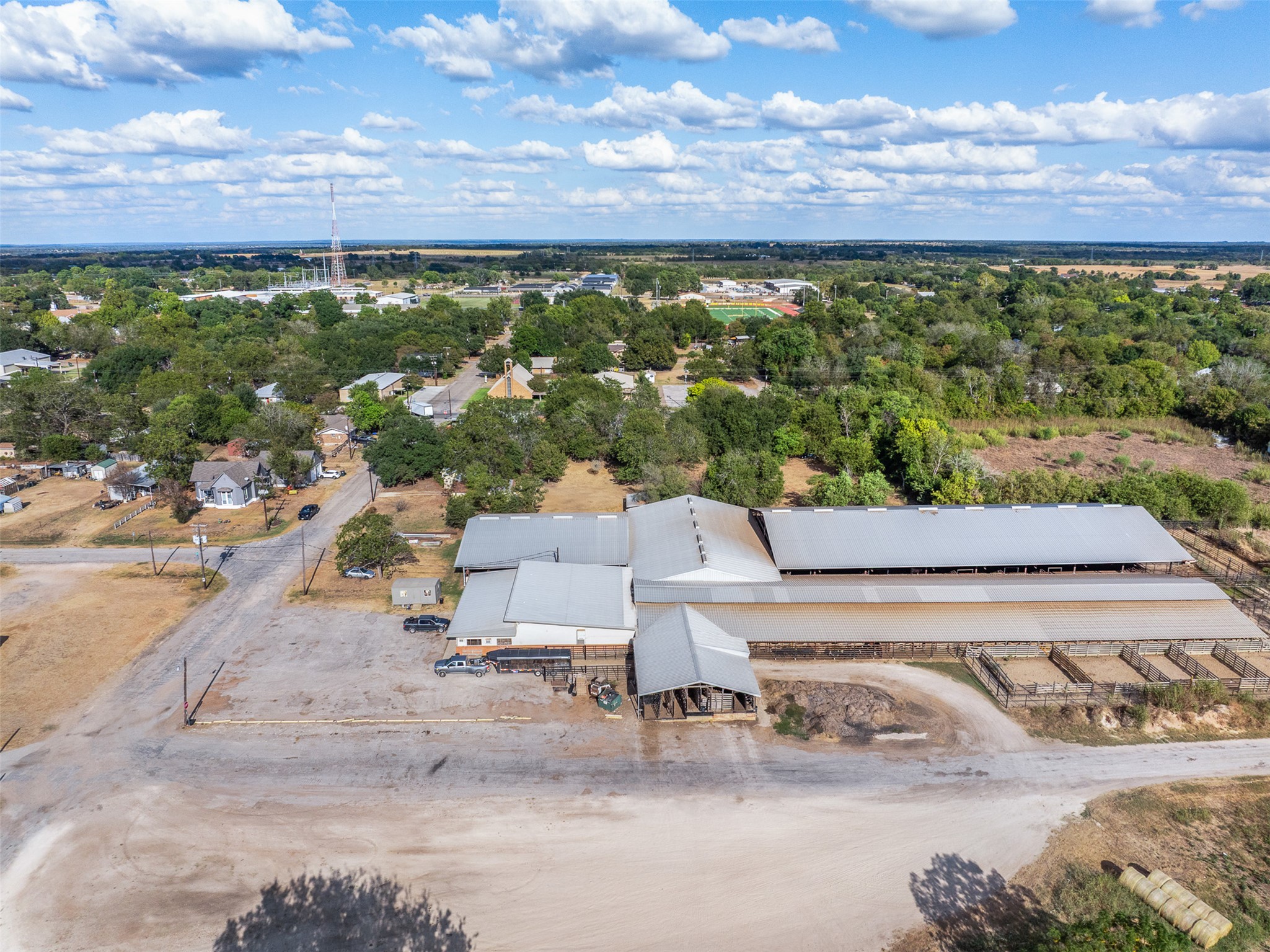 517 First Street Lexington, TX 78947 - Photo 34 of 37 an aerial view of a house with a yard and lake view