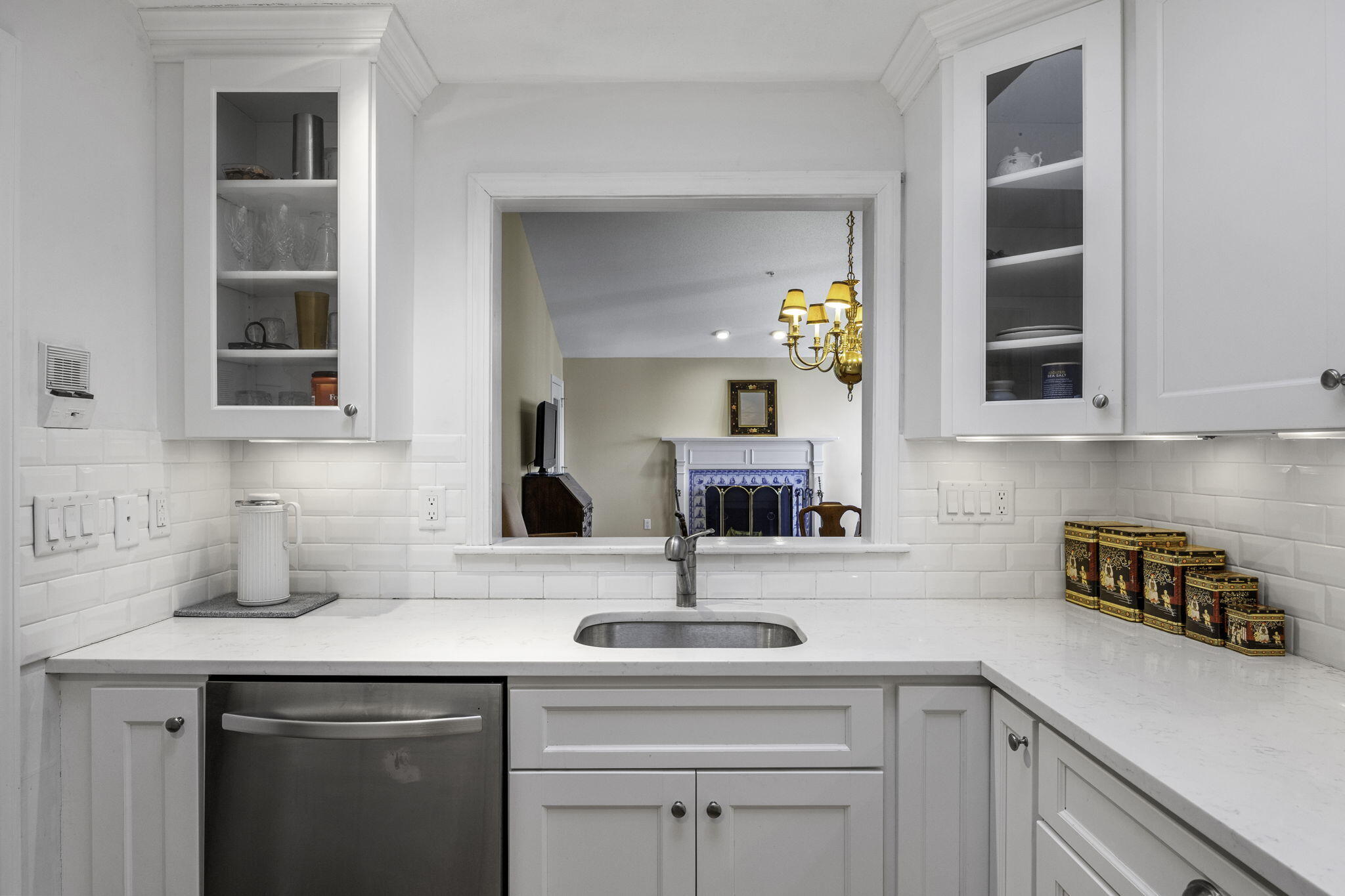 228 Kates Path Yarmouth Port, MA 02675 - Photo 11 of 30 a kitchen with a sink and cabinets