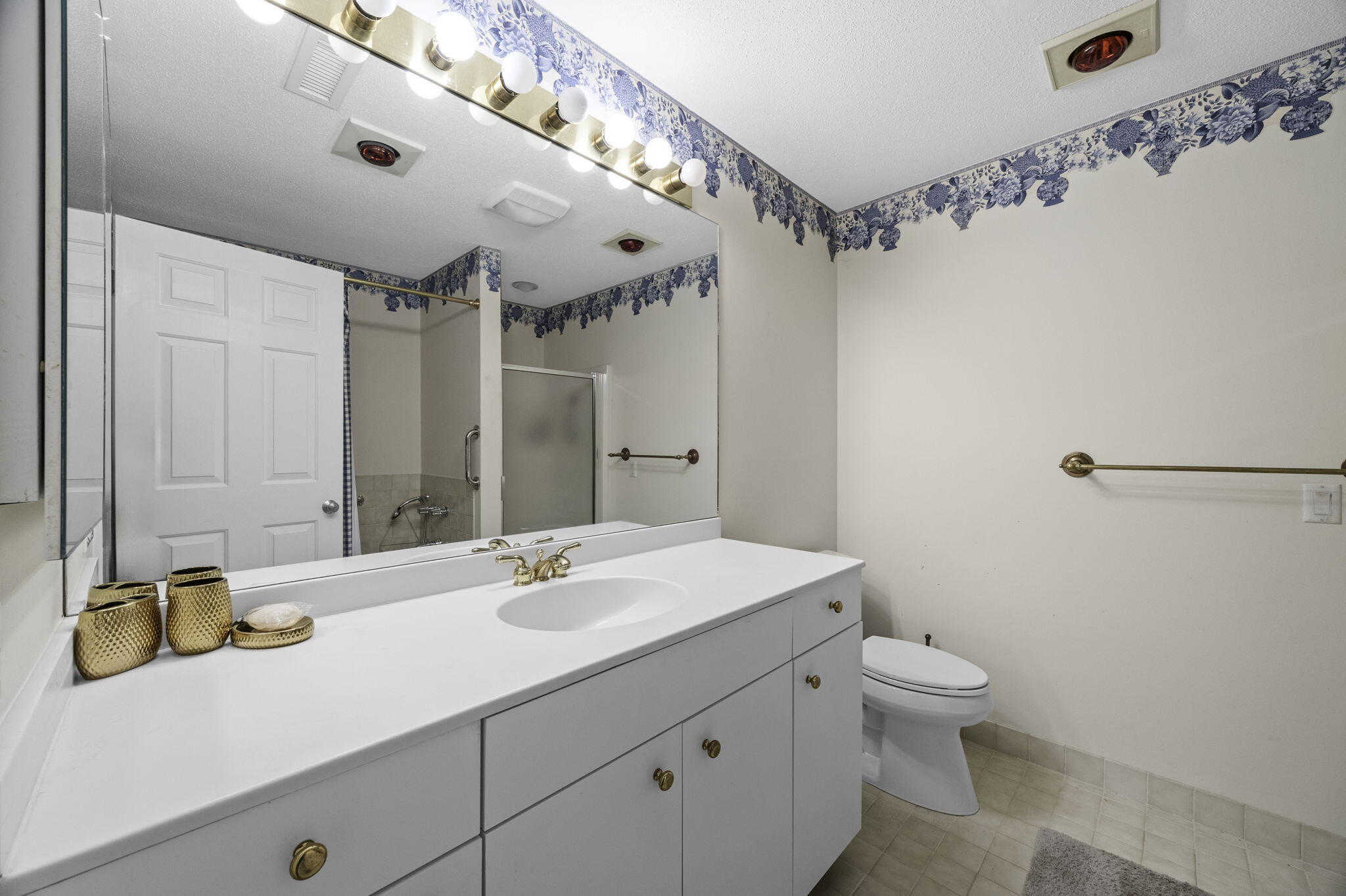 228 Kates Path Yarmouth Port, MA 02675 - Photo 17 of 30 a bathroom with a sink vanity granite and toilet