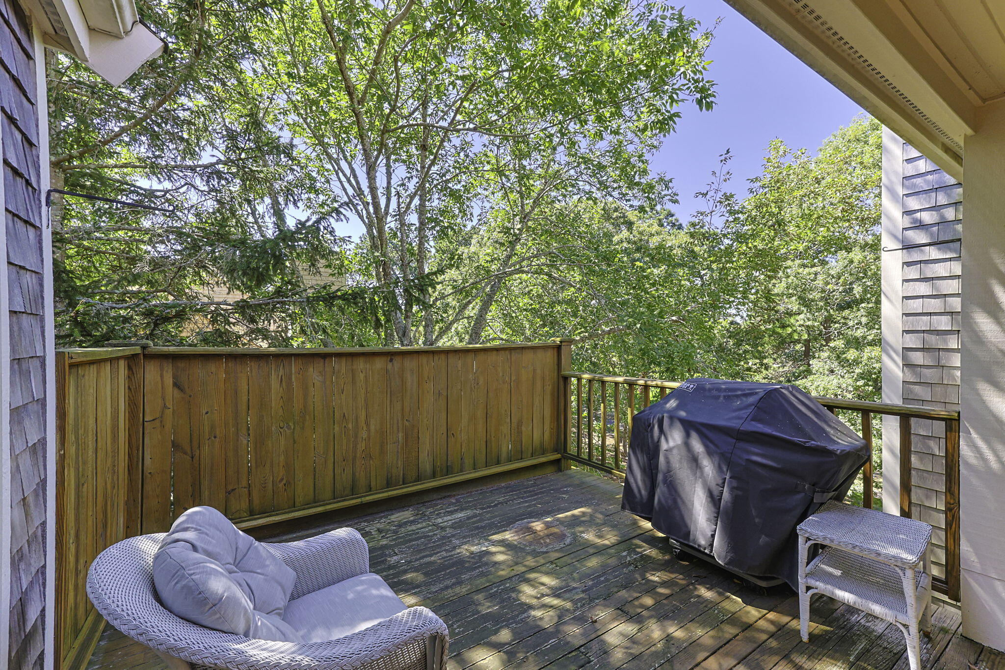 228 Kates Path Yarmouth Port, MA 02675 - Photo 18 of 30 a backyard of a house with table and chairs
