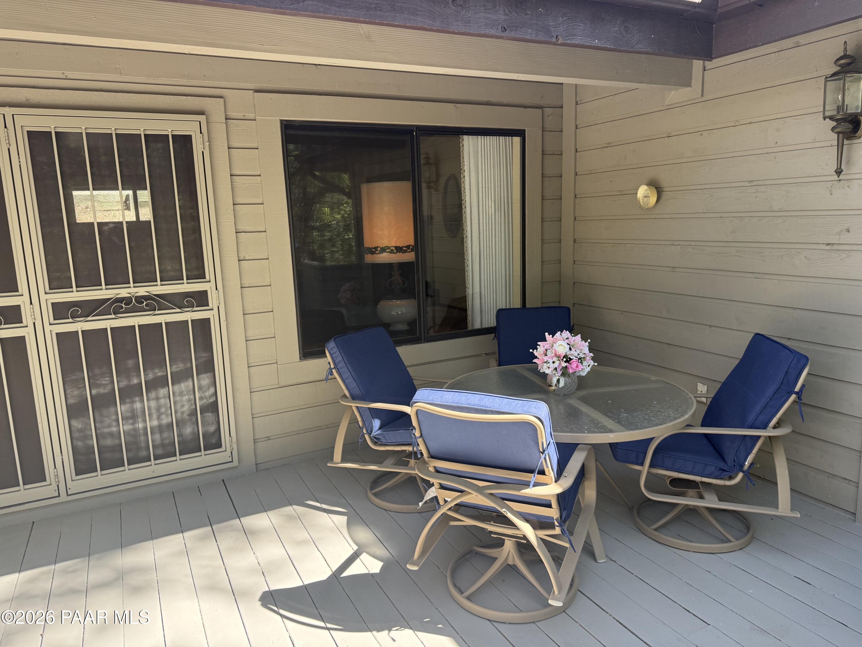 305 Ridge Court Prescott, AZ 86303 - Photo 19 of 35 a view of a chairs and table in a patio