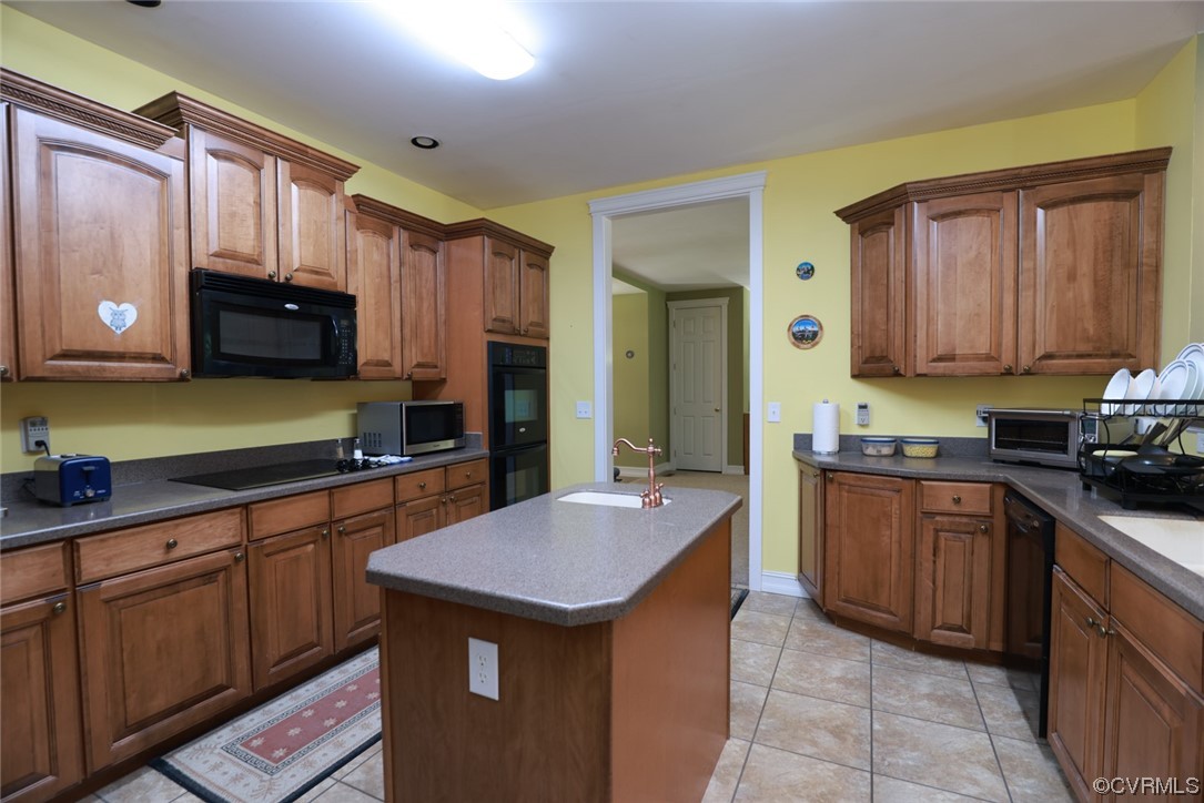 85 Rubermont Road Victoria, VA 23974 - Photo 11 of 49 a kitchen with stainless steel appliances granite countertop a sink stove and refrigerator