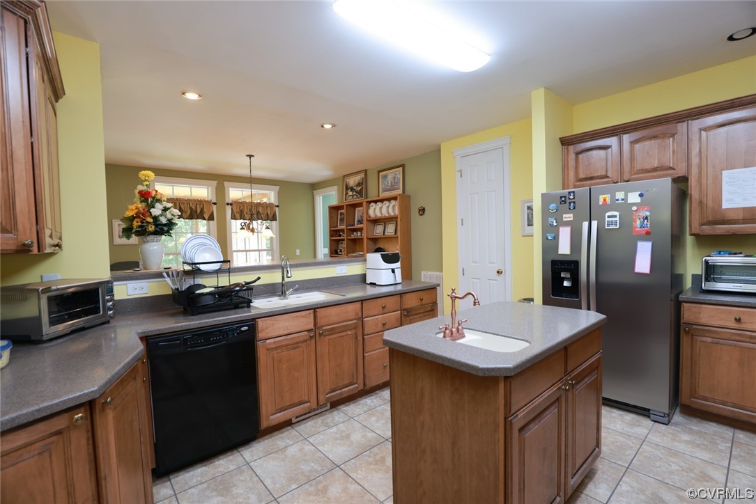 85 Rubermont Road Victoria, VA 23974 - Photo 13 of 49 a kitchen with granite countertop a sink counter space cabinets and stainless steel appliances