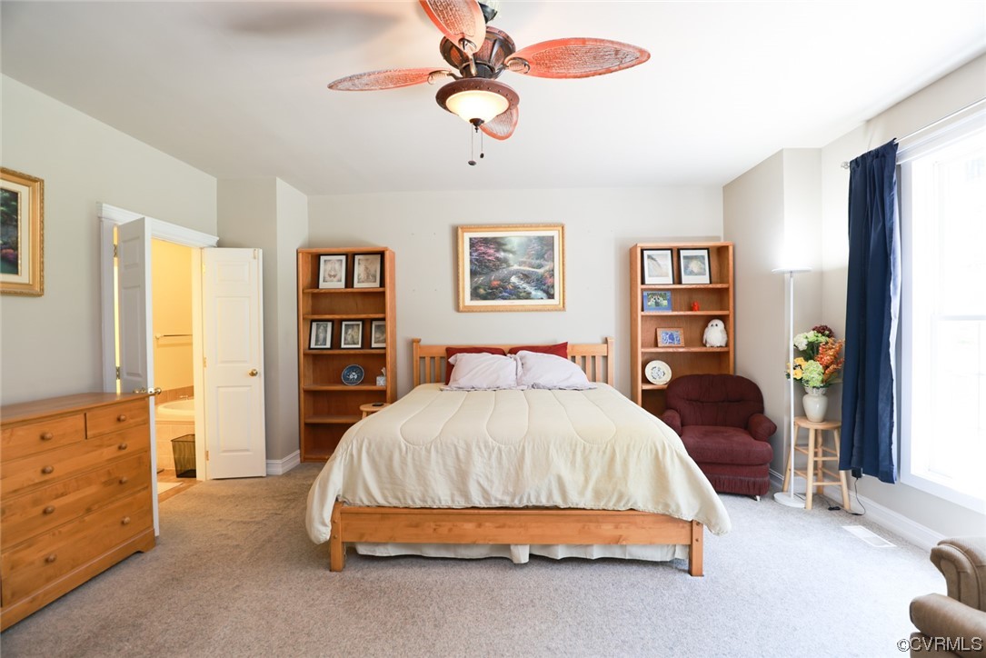 85 Rubermont Road Victoria, VA 23974 - Photo 14 of 49 a spacious bedroom with a bed and a cabinets