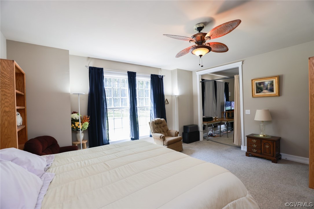 85 Rubermont Road Victoria, VA 23974 - Photo 15 of 49 a bedroom with a bed and a chandelier