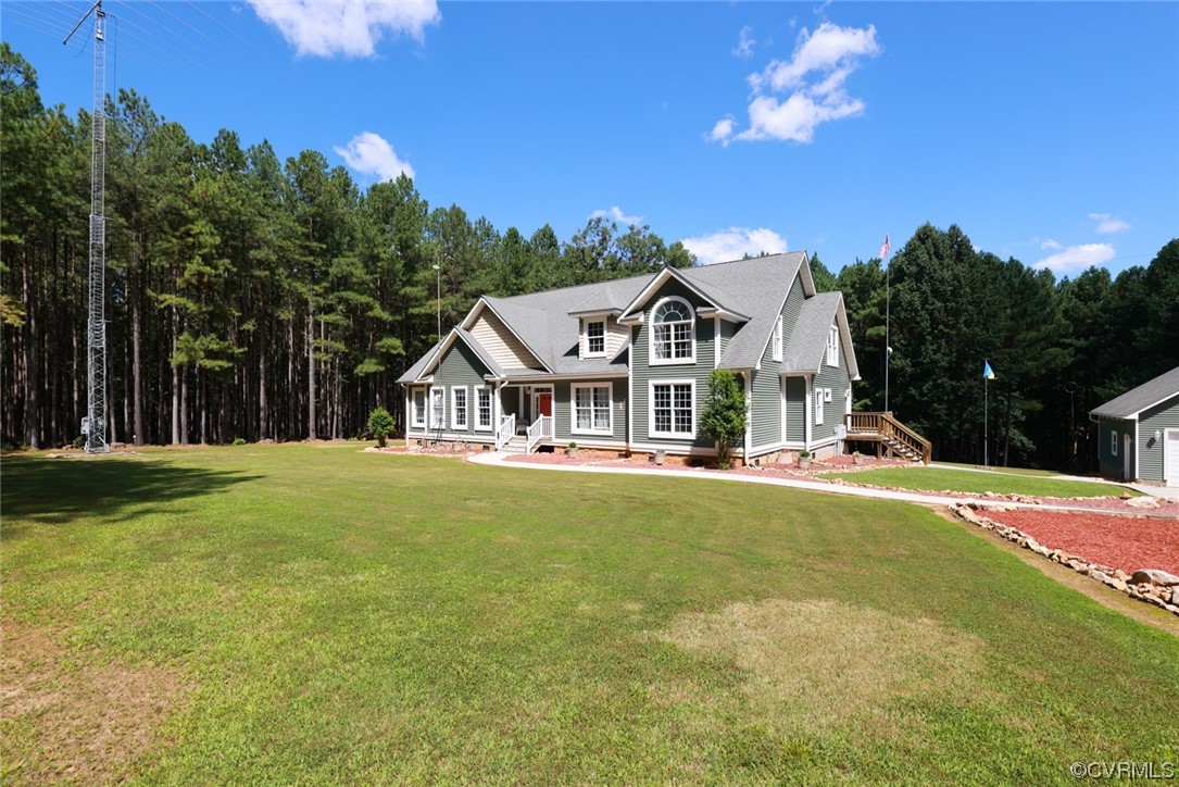 85 Rubermont Road Victoria, VA 23974 - Photo 2 of 49 a front view of a house with swimming pool having outdoor seating