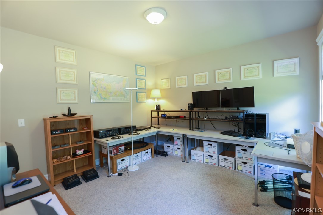 85 Rubermont Road Victoria, VA 23974 - Photo 26 of 49 a room with furniture and a flat screen tv