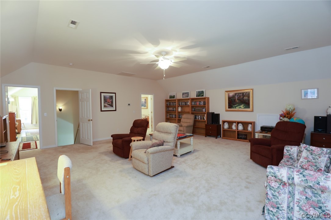 85 Rubermont Road Victoria, VA 23974 - Photo 31 of 49 a living room with furniture a lamp and a window