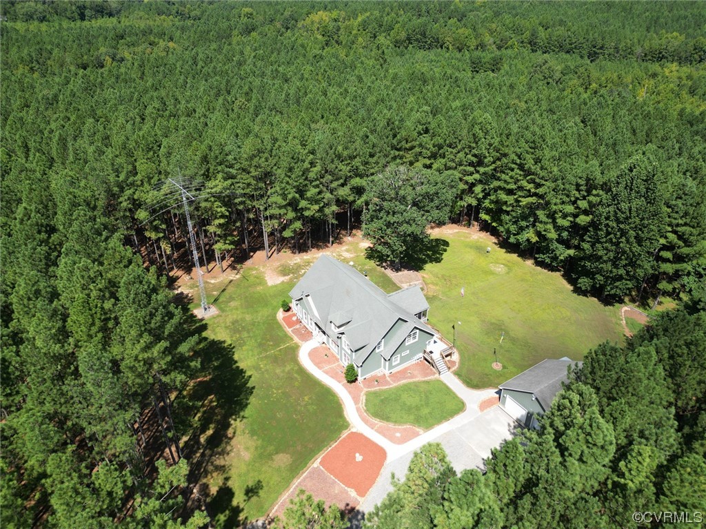 85 Rubermont Road Victoria, VA 23974 - Photo 4 of 49 an aerial view of a house with a yard and lake view