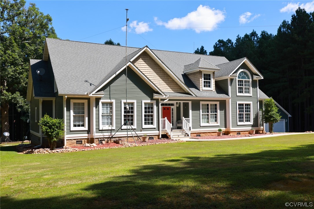 85 Rubermont Road Victoria, VA 23974 - Photo 41 of 49 a front view of a house with a yard table and chairs