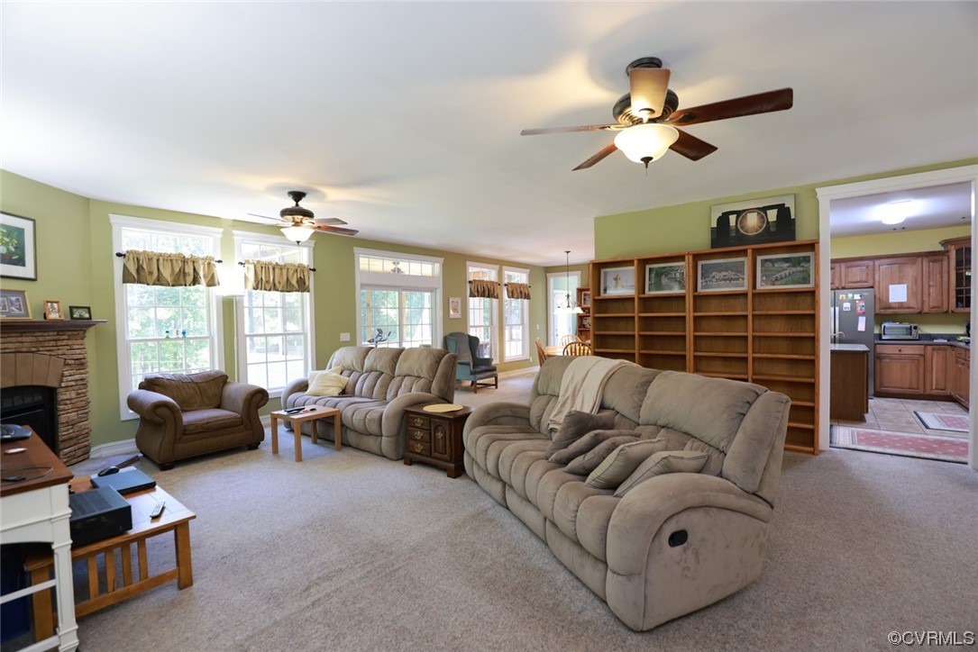 85 Rubermont Road Victoria, VA 23974 - Photo 7 of 49 a living room with furniture fireplace and flat screen tv