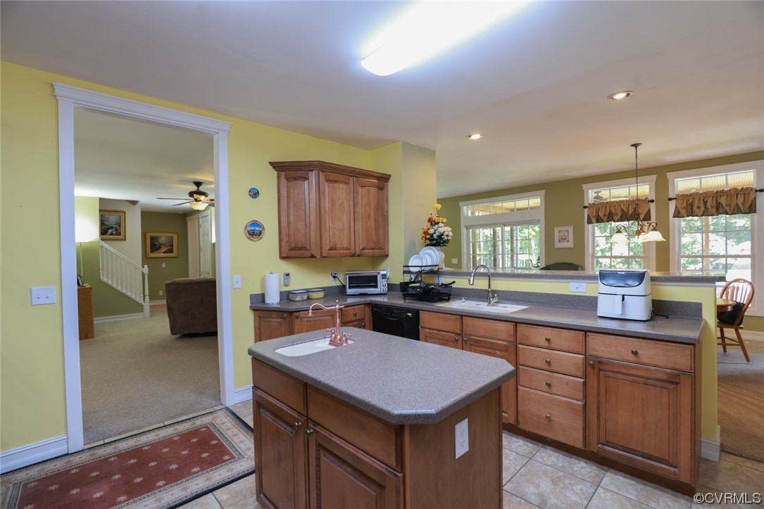 85 Rubermont Road Victoria, VA 23974 - Photo 10 of 49 a kitchen with a sink stove and cabinets