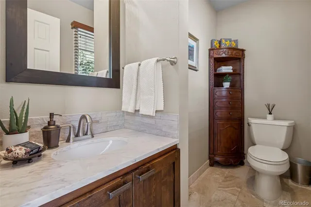 a bathroom with a sink and a toilet