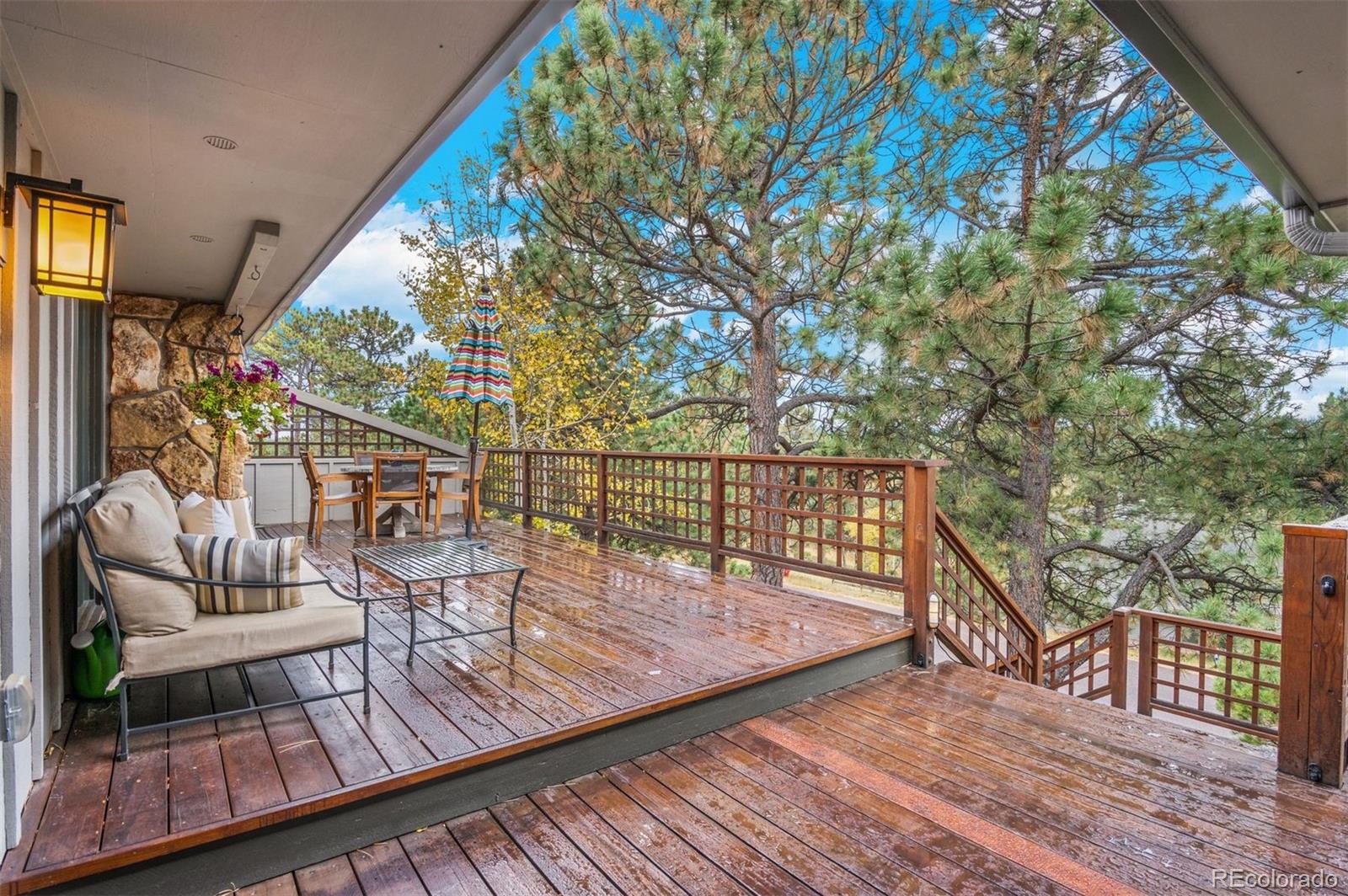 32329 Inverness Drive Evergreen, CO 80439 - Photo 40 of 48 a balcony with chairs