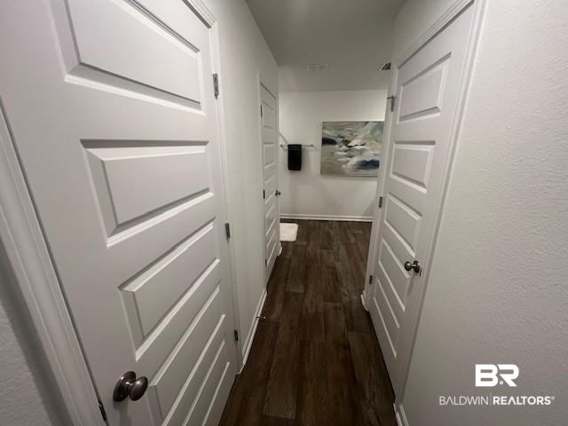 14717 Dayton Circle Foley, AL 36535 - Photo 27 of 39 Hallway with dark hardwood / wood-style flooring