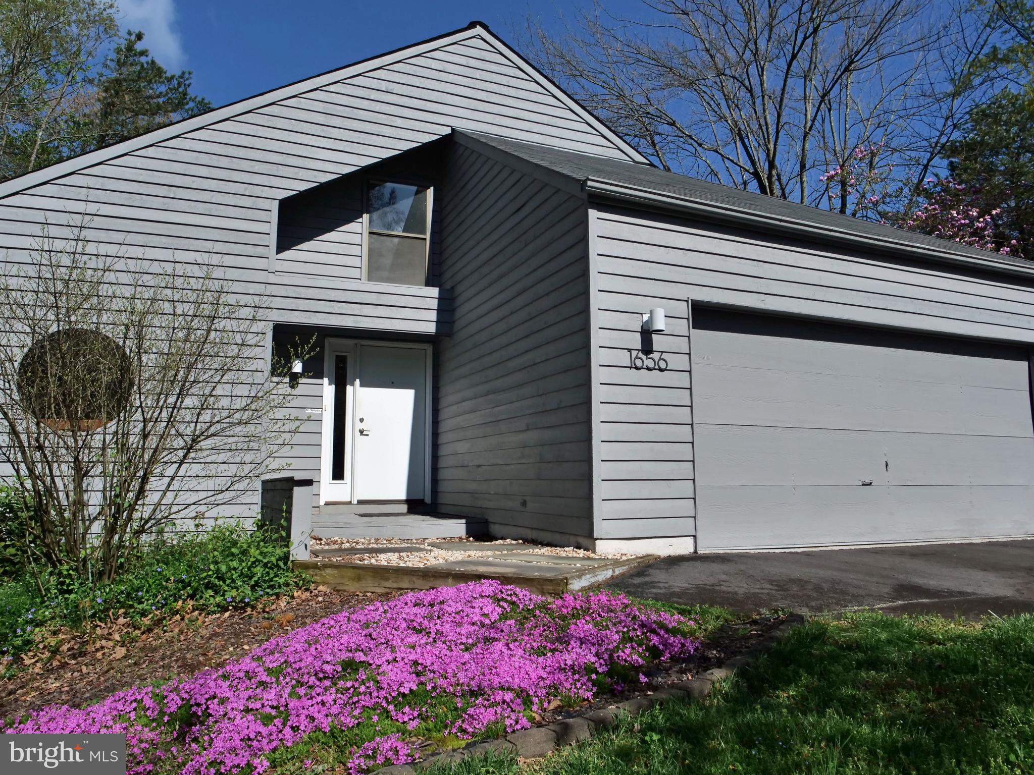 1656 Cedar Hollow Way Reston, VA 20194 - Photo 1 of 28 a front view of house with yard