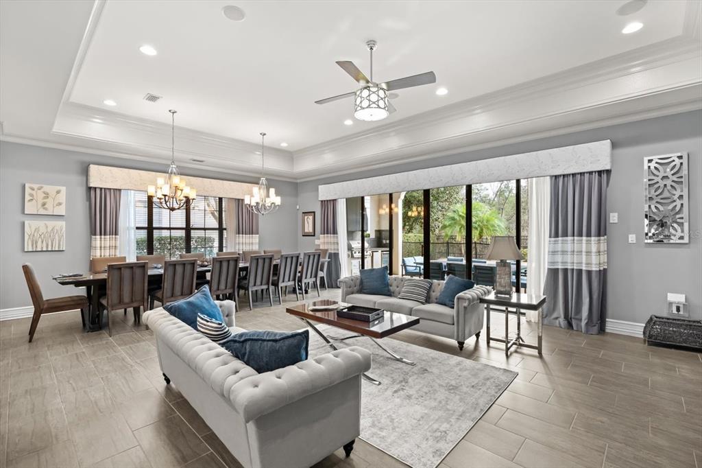 1105 Watson Court Reunion, FL 34747 - Photo 13 of 61 a living room with furniture and a large window