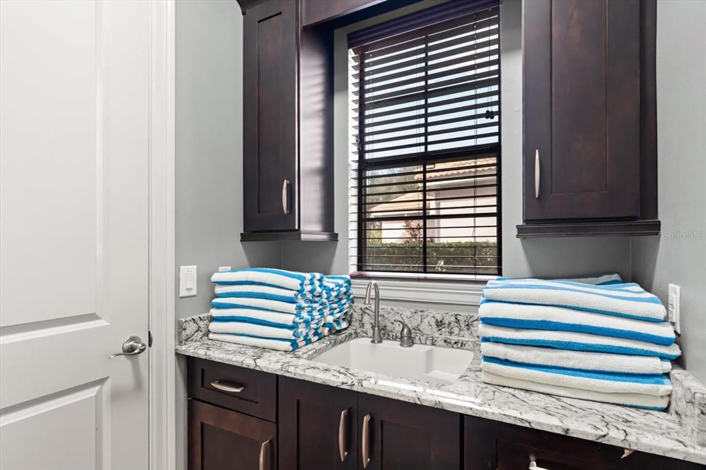 1105 Watson Court Reunion, FL 34747 - Photo 23 of 61 a bathroom with a sink and a window