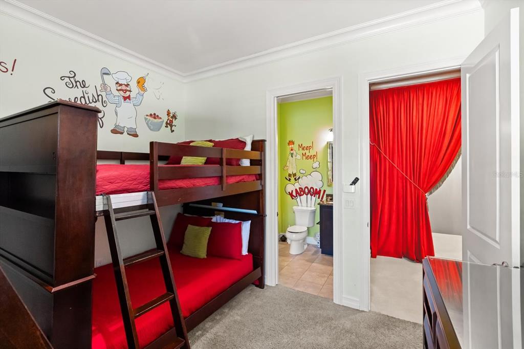 1105 Watson Court Reunion, FL 34747 - Photo 41 of 61 a bedroom with a bed and a window