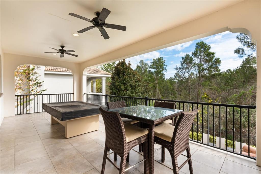 1105 Watson Court Reunion, FL 34747 - Photo 46 of 61 a view of a chairs and table in a balcony