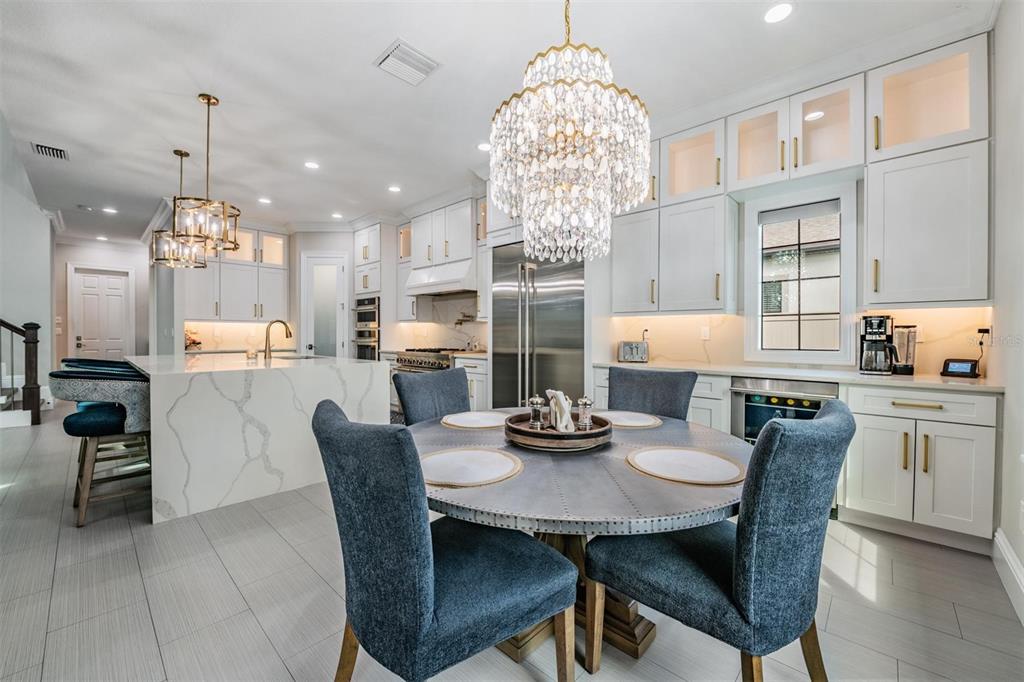 2913 Valencia Ridge Street Valrico, FL 33596 - Photo 15 of 31 a view of a dining room and chandelier fan