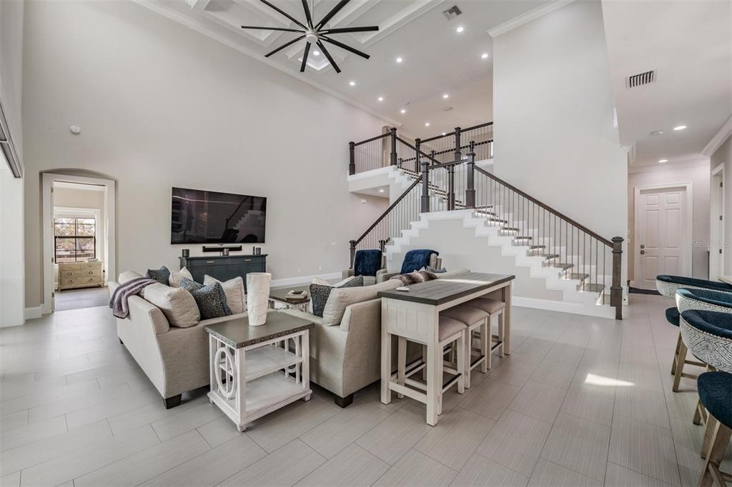 2913 Valencia Ridge Street Valrico, FL 33596 - Photo 17 of 31 a living room with furniture and a flat screen tv
