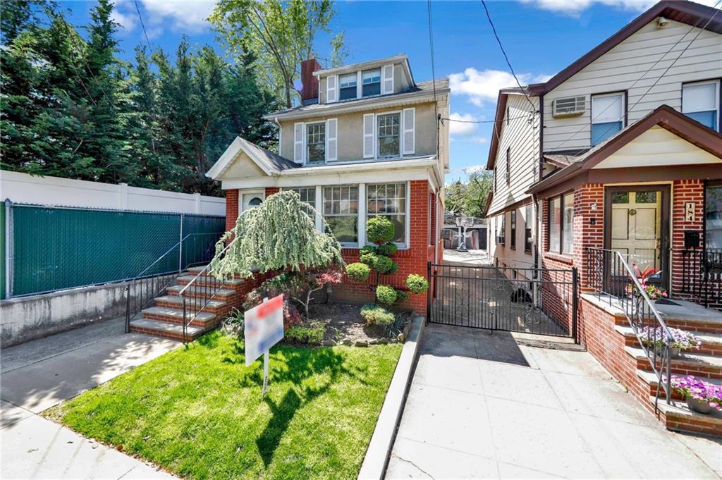 188 79th Street Brooklyn, NY 11209 - Photo 2 of 30 a front view of a house with garden