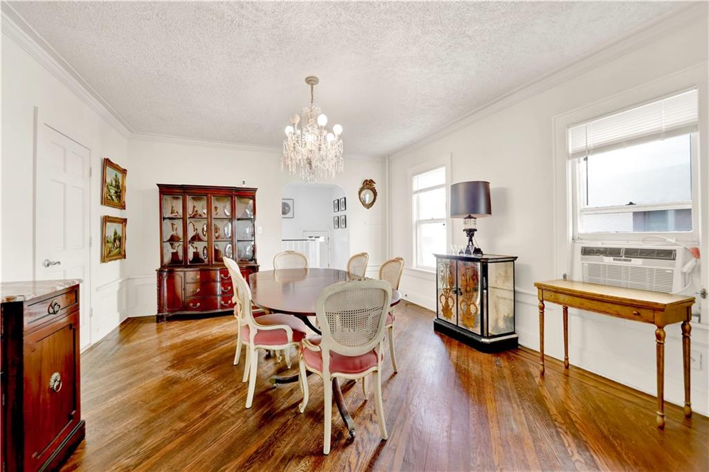 188 79th Street Brooklyn, NY 11209 - Photo 12 of 30 a view of a dining room with furniture and wooden floor