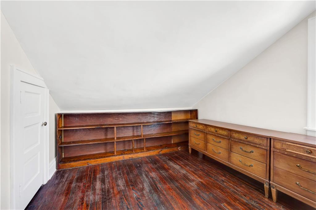 188 79th Street Brooklyn, NY 11209 - Photo 20 of 30 a view of an empty room and wooden floor