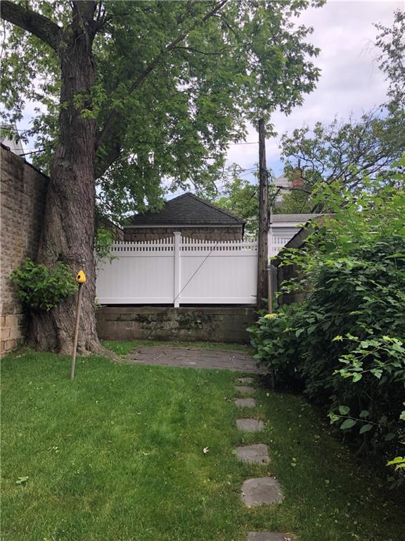 188 79th Street Brooklyn, NY 11209 - Photo 30 of 30 a view of a backyard with large trees