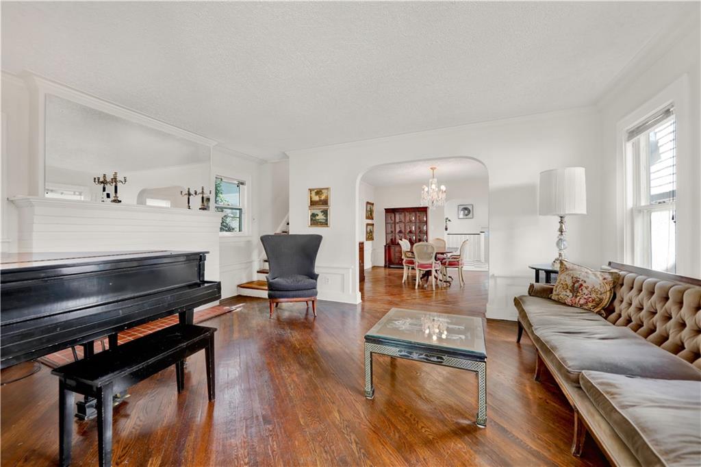 188 79th Street Brooklyn, NY 11209 - Photo 8 of 30 a living room with furniture and wooden floor