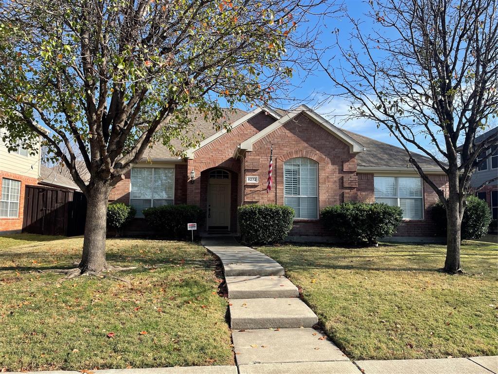 8272 Beartooth Drive Frisco, TX 75036 - Photo 1 of 16 a front view of a house with a yard