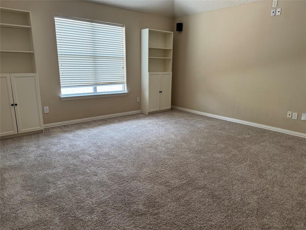 8272 Beartooth Drive Frisco, TX 75036 - Photo 15 of 16 an empty room with a window