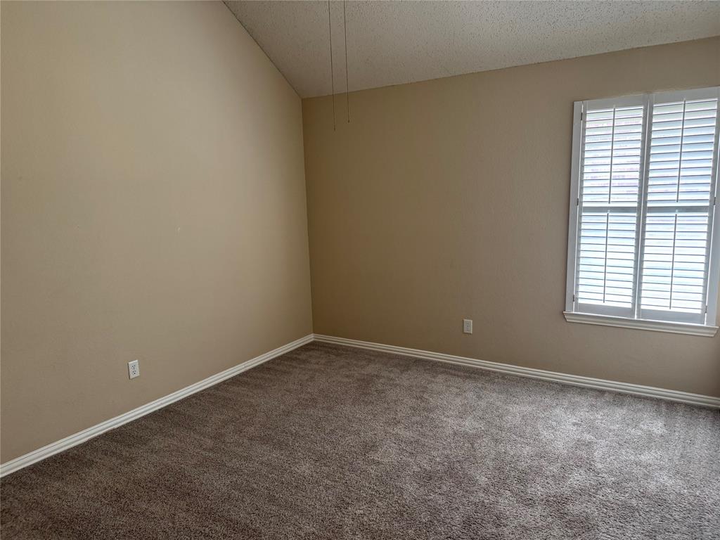 8272 Beartooth Drive Frisco, TX 75036 - Photo 8 of 16 an empty room with a window