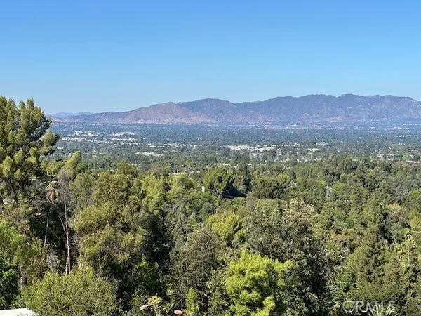 a view of a city with mountain