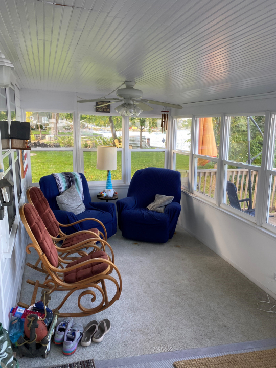 42434 North Witt Road Antioch, IL 60002 - Photo 11 of 15 a living room with furniture and a floor to ceiling window