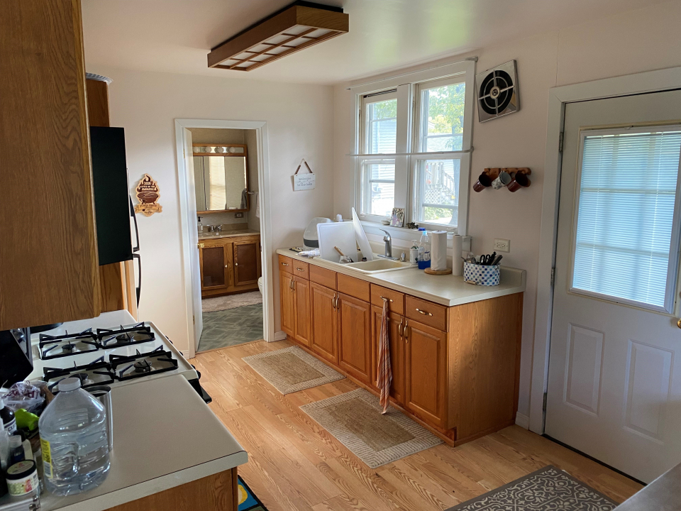 42434 North Witt Road Antioch, IL 60002 - Photo 6 of 15 a kitchen with stainless steel appliances granite countertop a sink stove and refrigerator