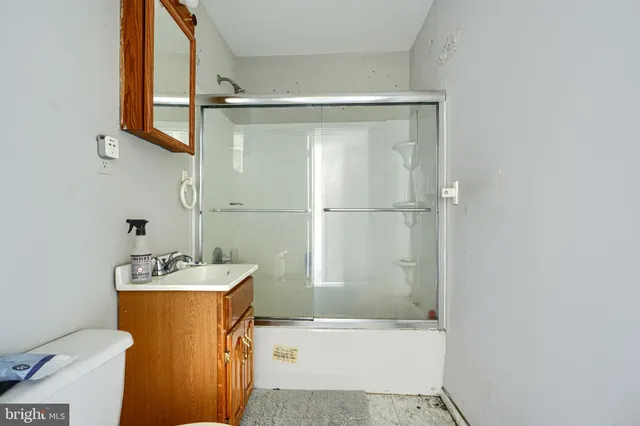 wooden floor to ceiling window and fire place