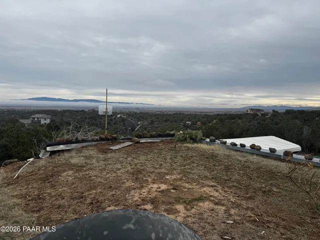 a view of a road with an ocean