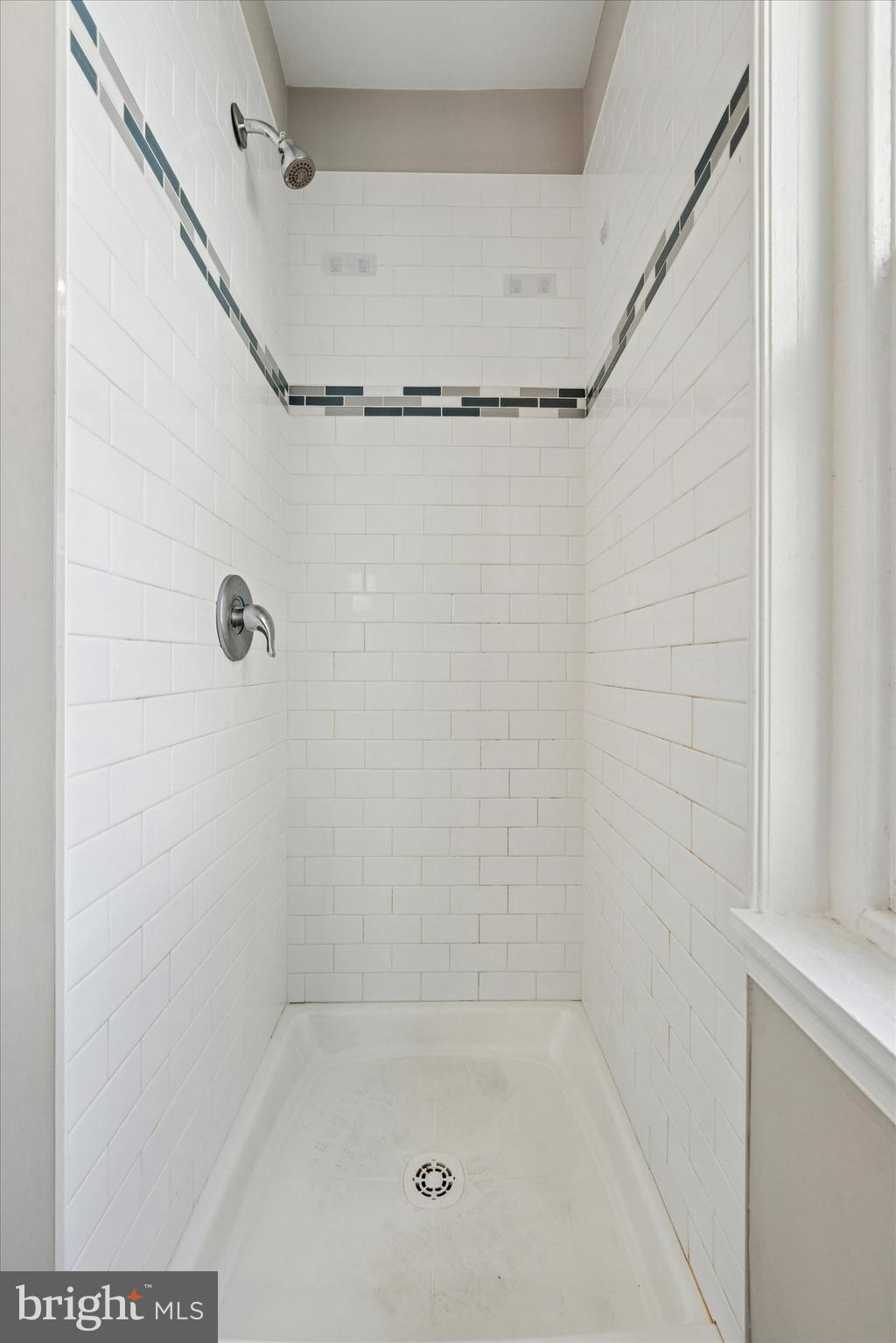 19 South New Street, Unit 2 West Chester, PA 19382 - Photo 13 of 20 a bathroom with a shower