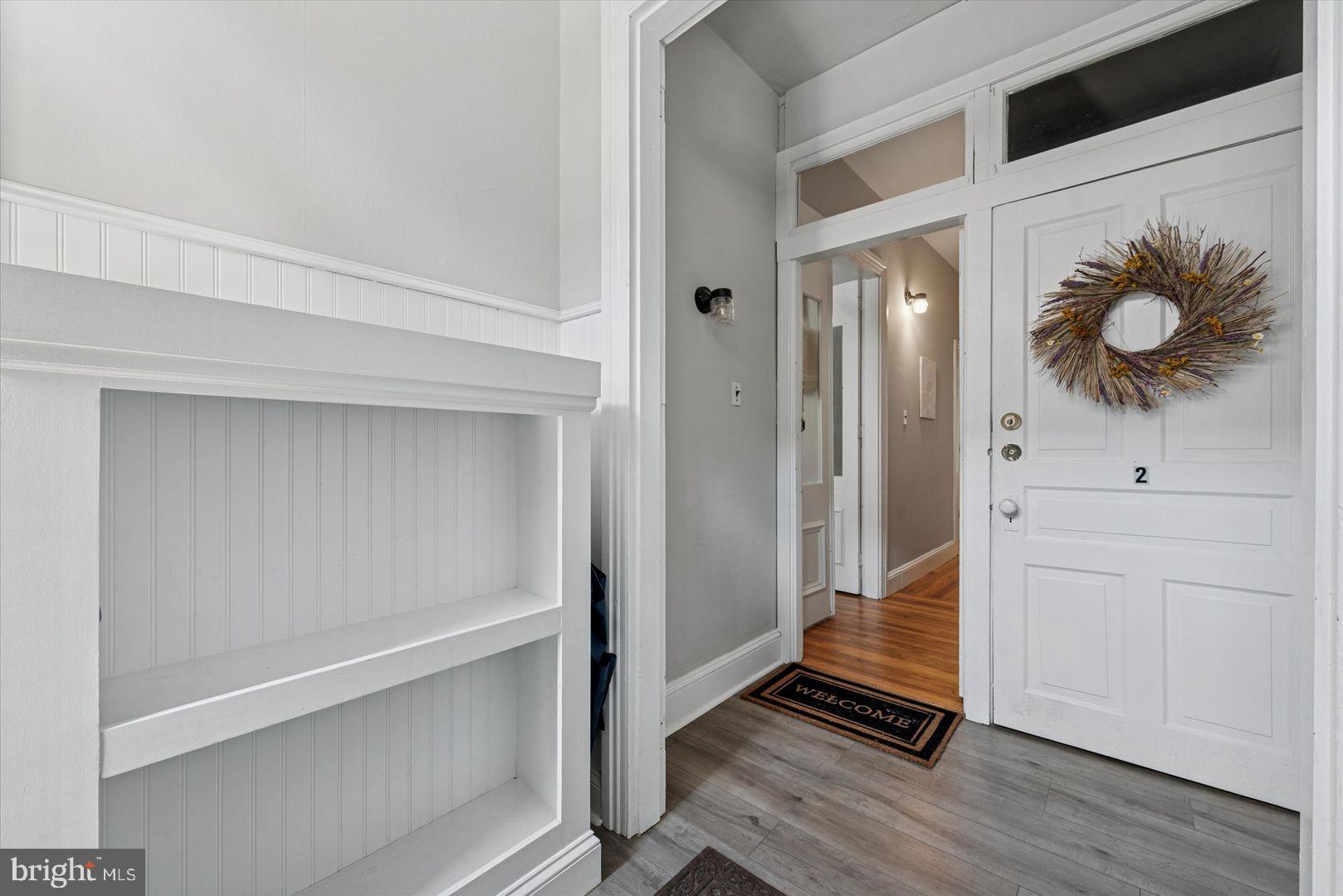 19 South New Street, Unit 2 West Chester, PA 19382 - Photo 3 of 20 a view of front door with wooden floor