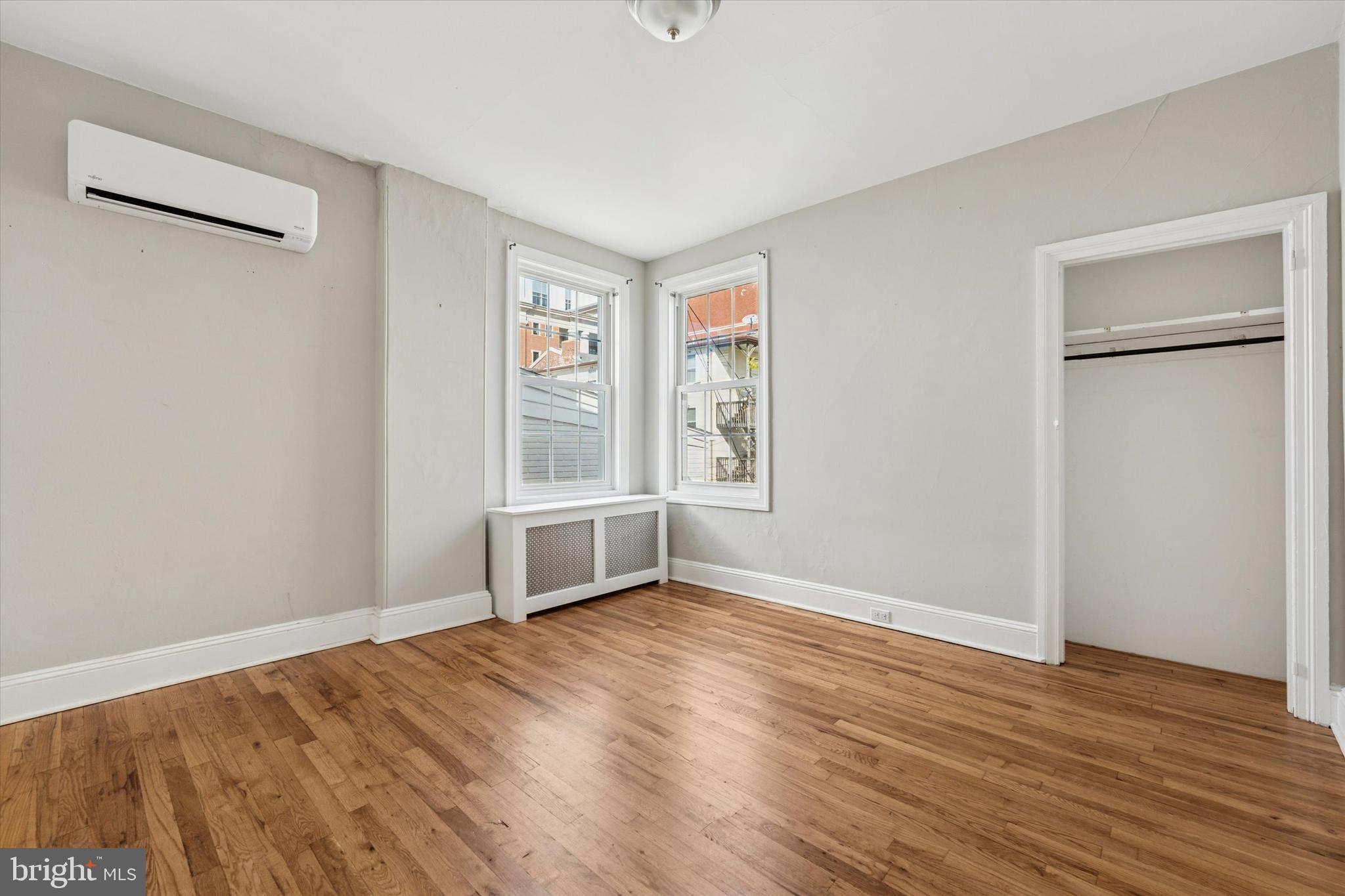 19 South New Street, Unit 2 West Chester, PA 19382 - Photo 6 of 20 a view of empty room with wooden floor and fan