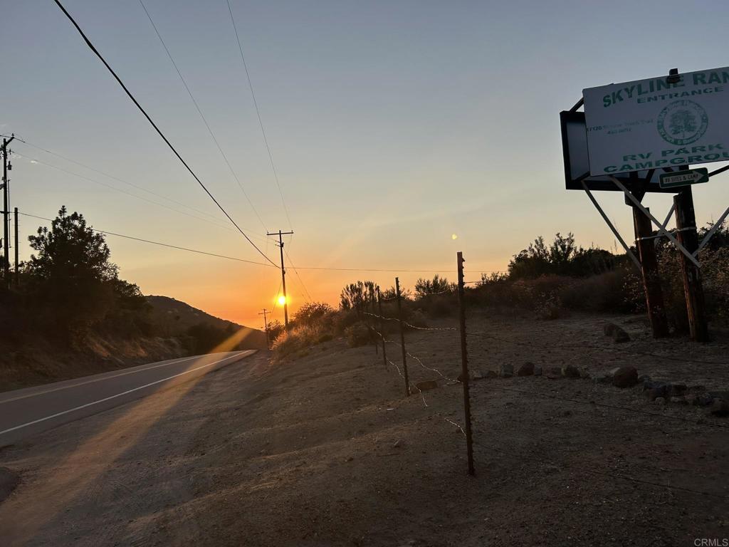 Skyline Truck Trail Jamul, CA 91935 - Photo 2 of 19 a view of a dry yard with wooden fence