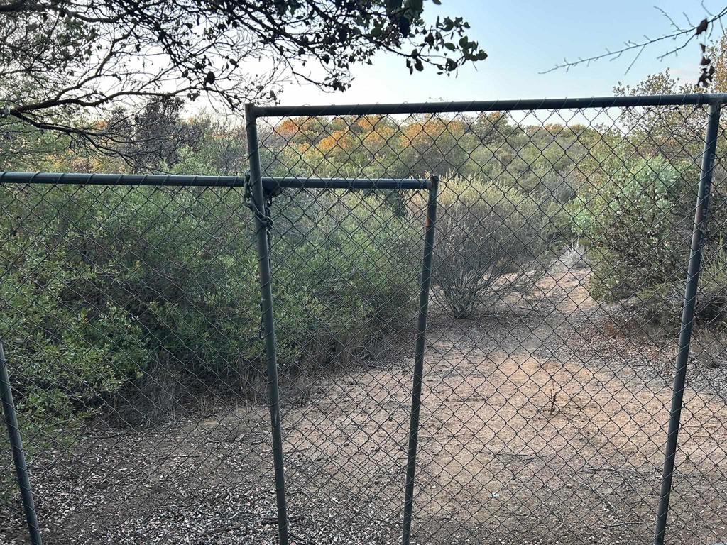 Skyline Truck Trail Jamul, CA 91935 - Photo 4 of 19 a view of a glass door with a yard
