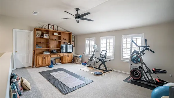 a view of a room with gym equipment