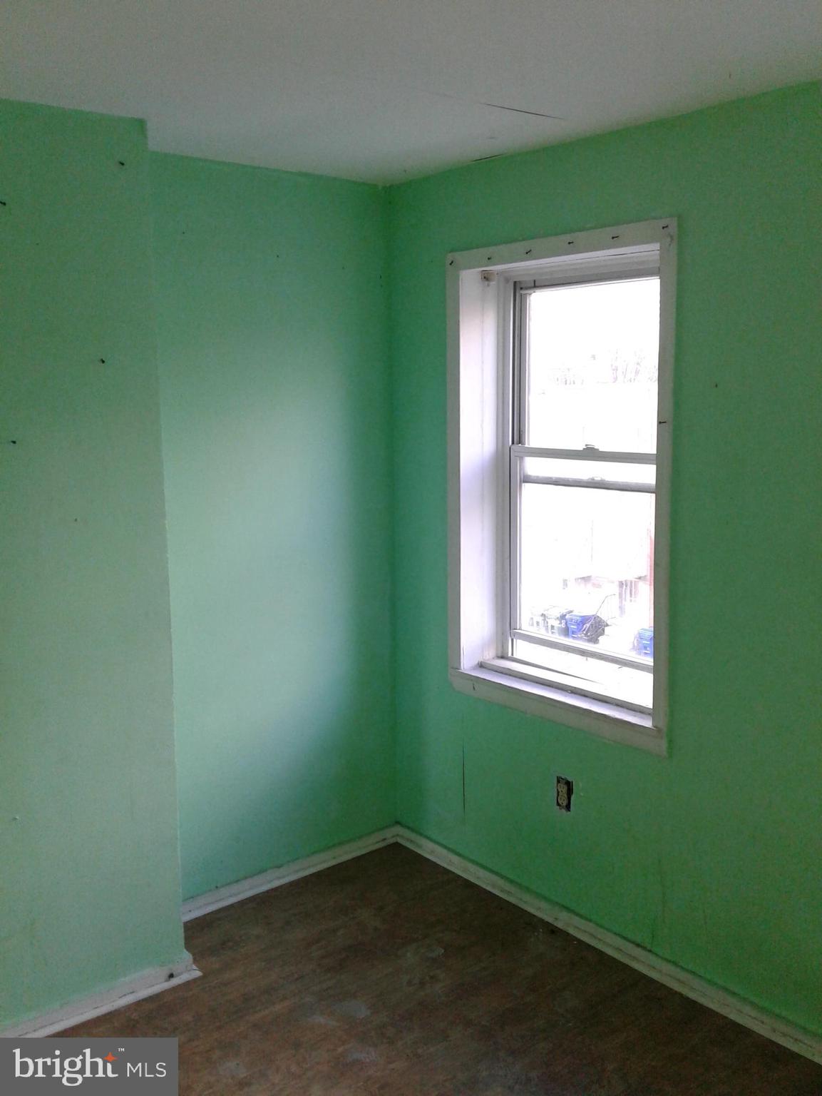 1833 Ramsay Street Baltimore, MD 21223 - Photo 8 of 14 a view of a room that has a window in it